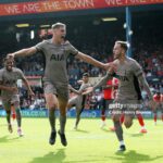 Resilient Tottenham go top of the league