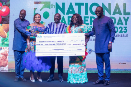 Charity Akortia recieving her cheque